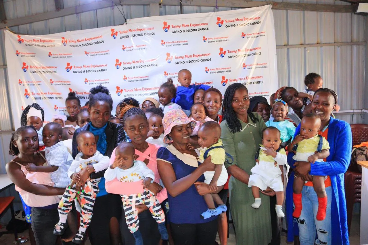 A large group of mothers and babies gathered at the centre